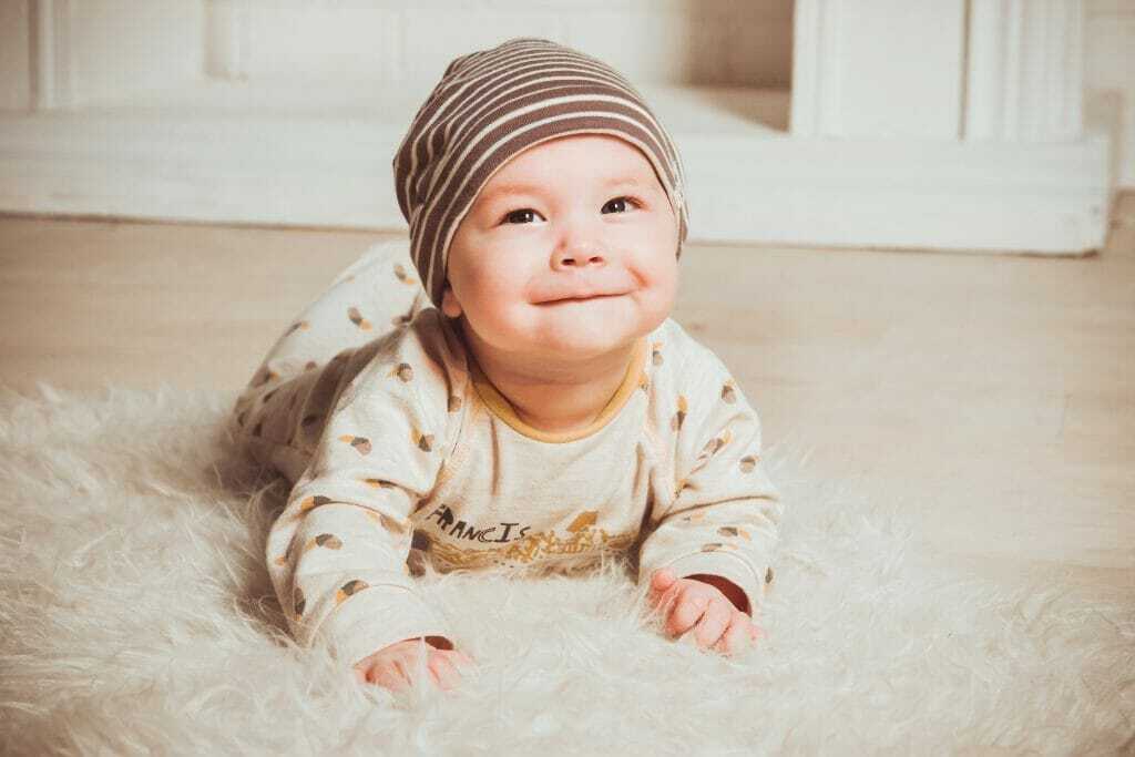 Child Playing on Rug